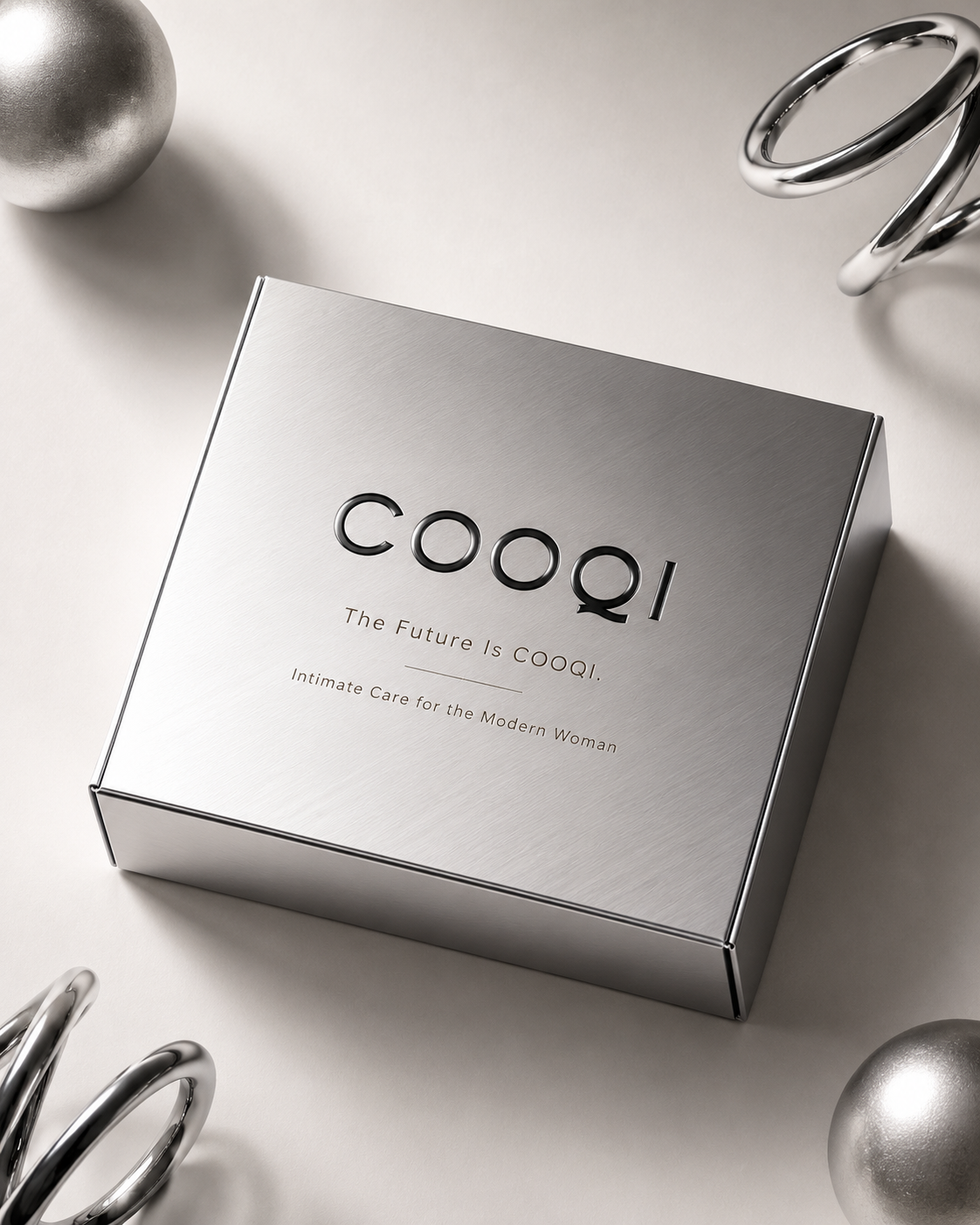 COOQI intimate care packaging box in brushed silver